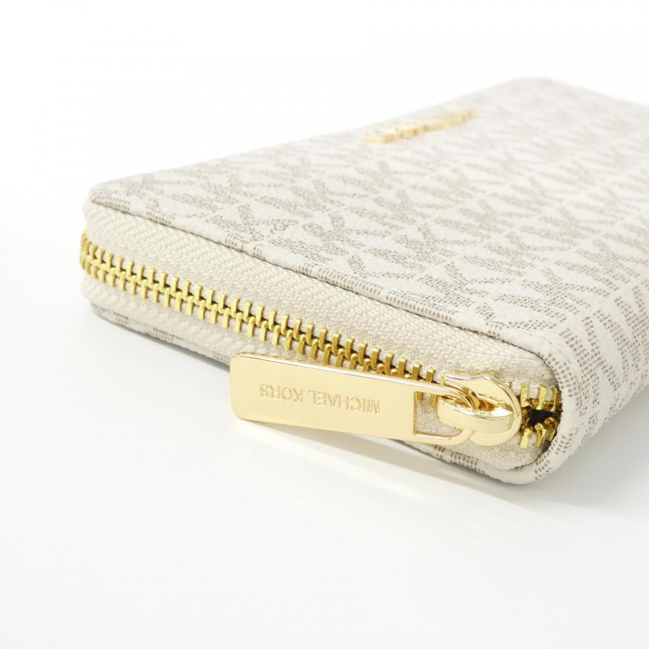 【新品】マイケルマイケルコース JET SET TRAVEL 35F8GTVE9B 財布