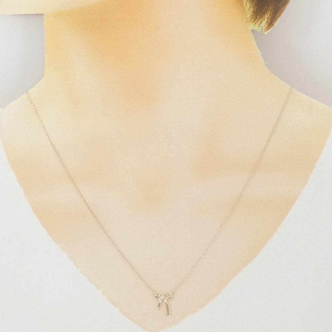 K10PG リボン ダイヤモンド ネックレス 0.01CT