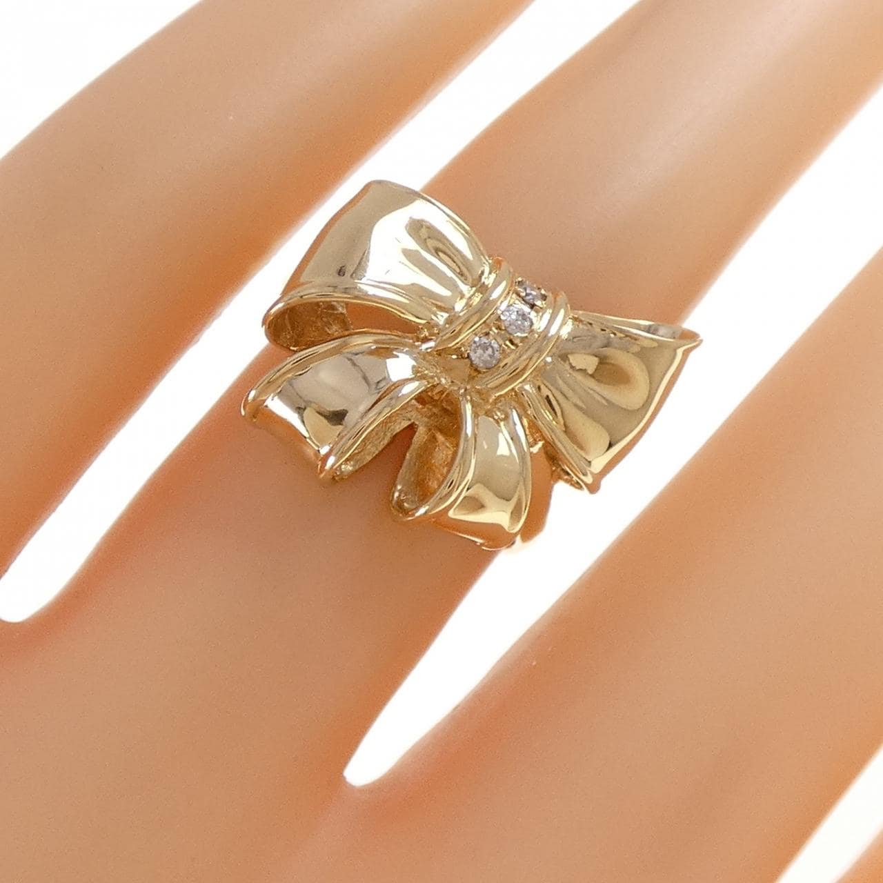 K18YG リボン ダイヤモンド リング 0.03CT