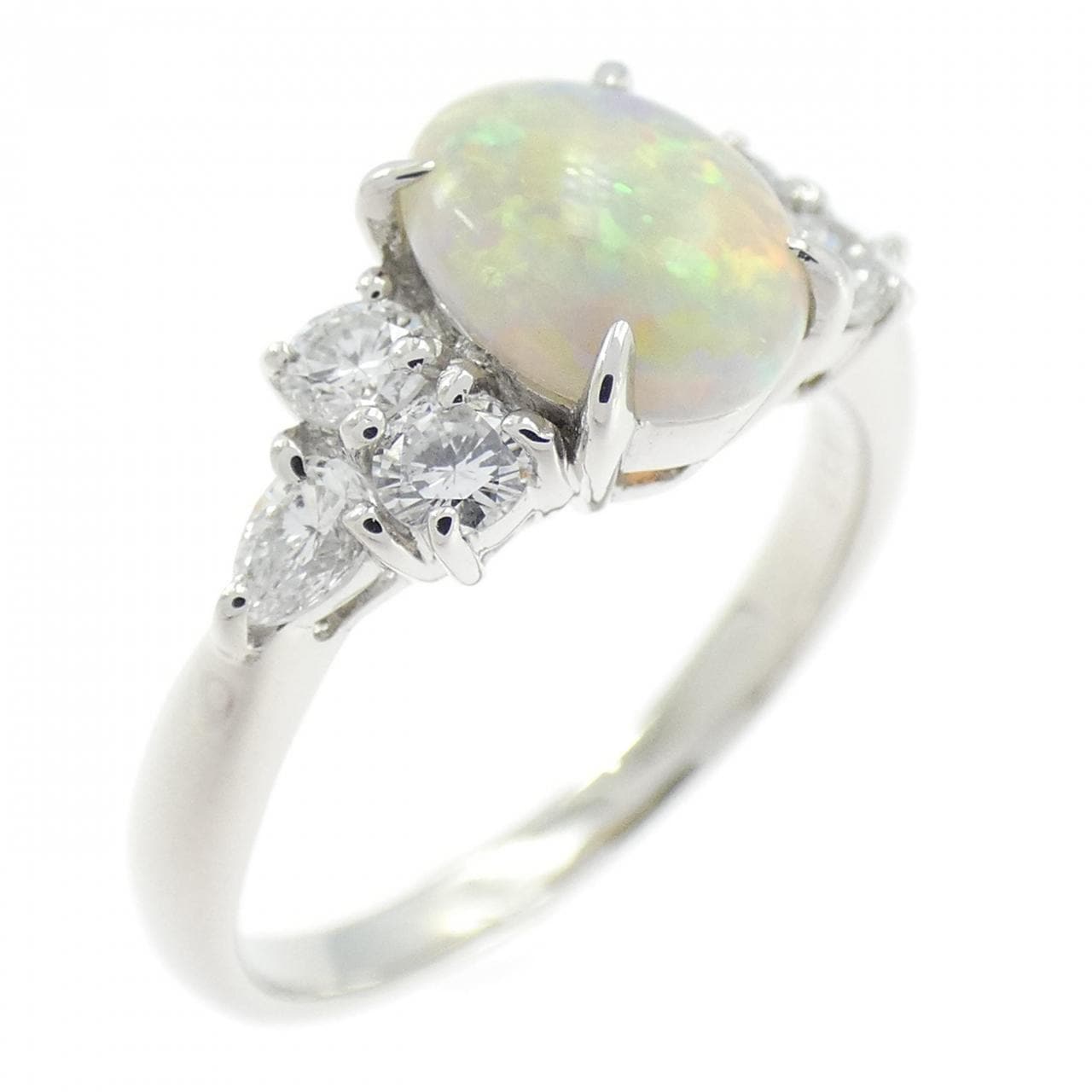 PT900 OPAL Ring 0.657CT