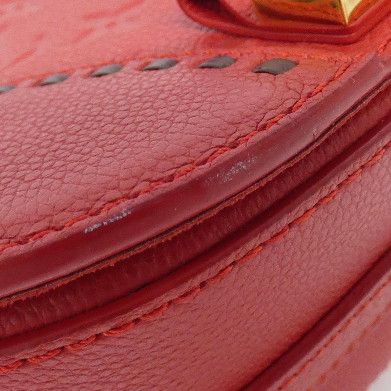 LOUIS VUITTON Monogram Empreinte Juno M43144 Shoulder Bag