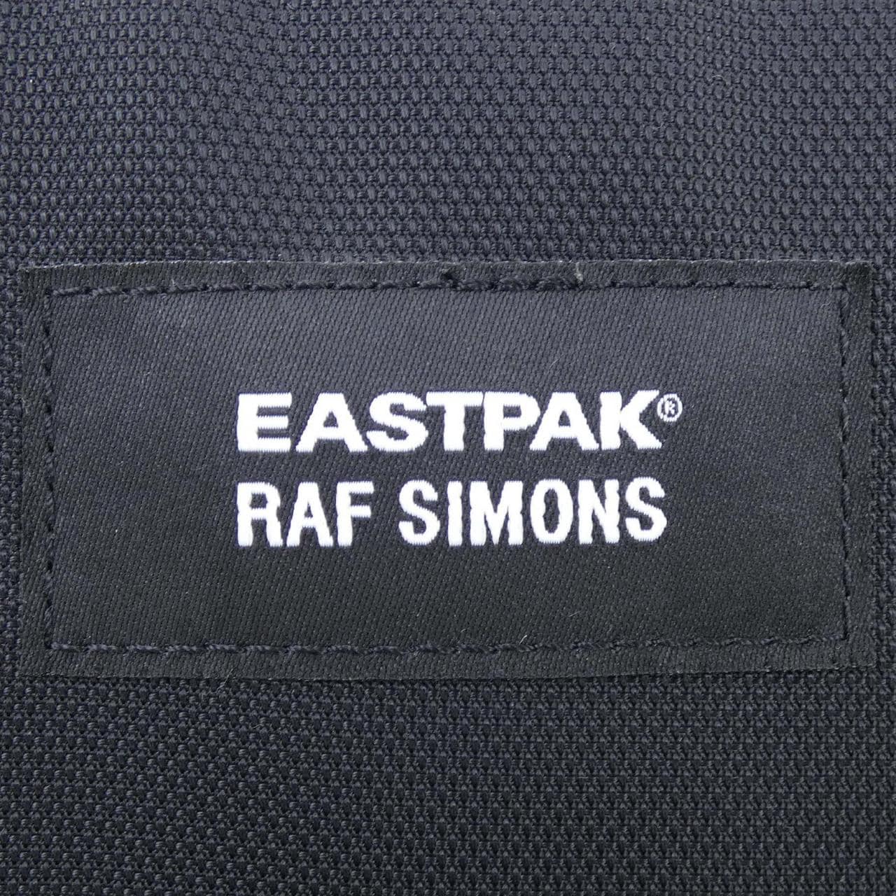 イーストパックバイラクフシモンズ EASTPAK BY RAF SIMONS BACKPACK
