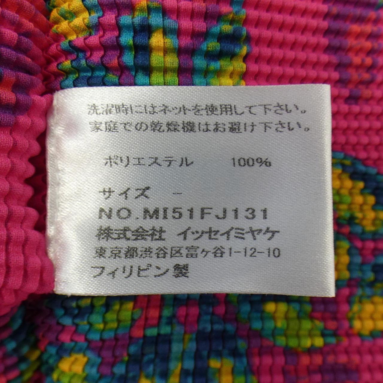 ミーイッセイミヤケ me ISSEY MIYAKE トップス