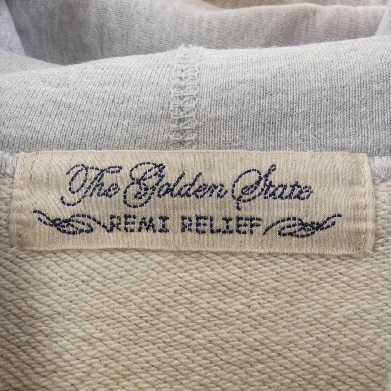 レミレリーフ REMI RELIEF パーカー