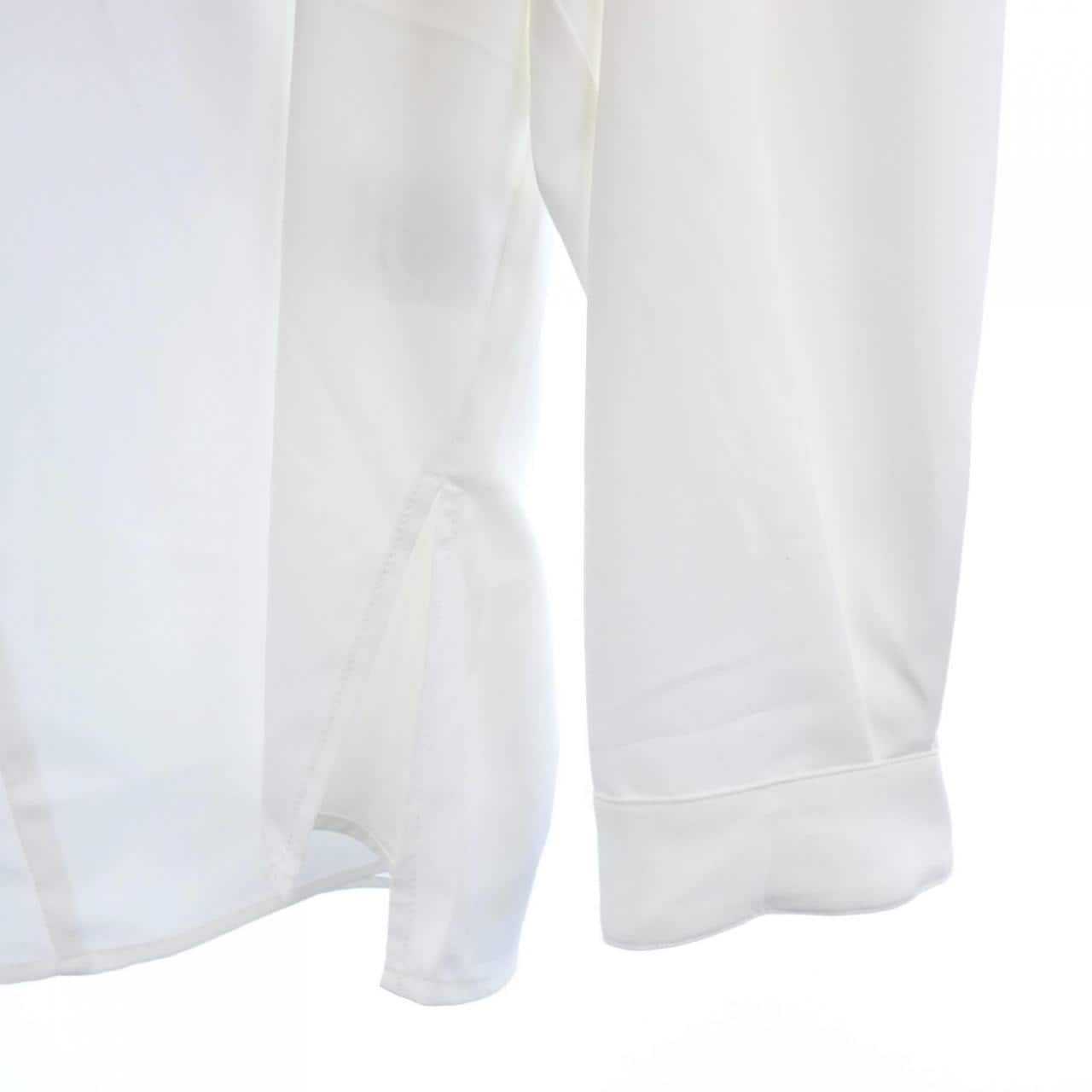 Jih Nunc トップス