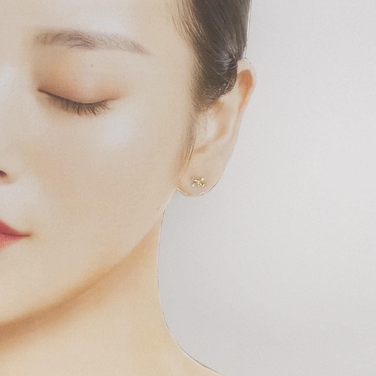 【新品】K10YG リボン ダイヤモンド ピアス 0.02CT