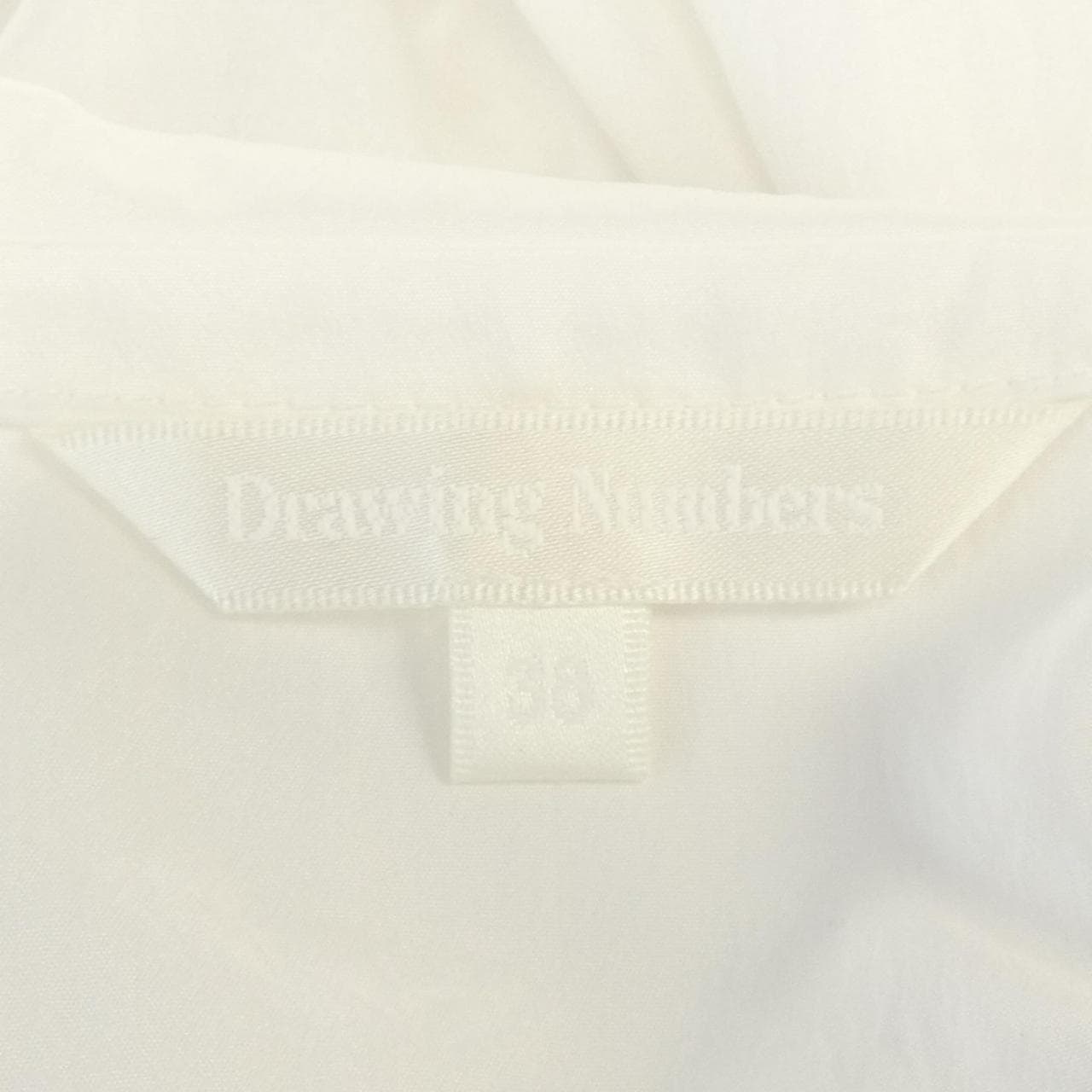 DRAWING NUMBERS トップス