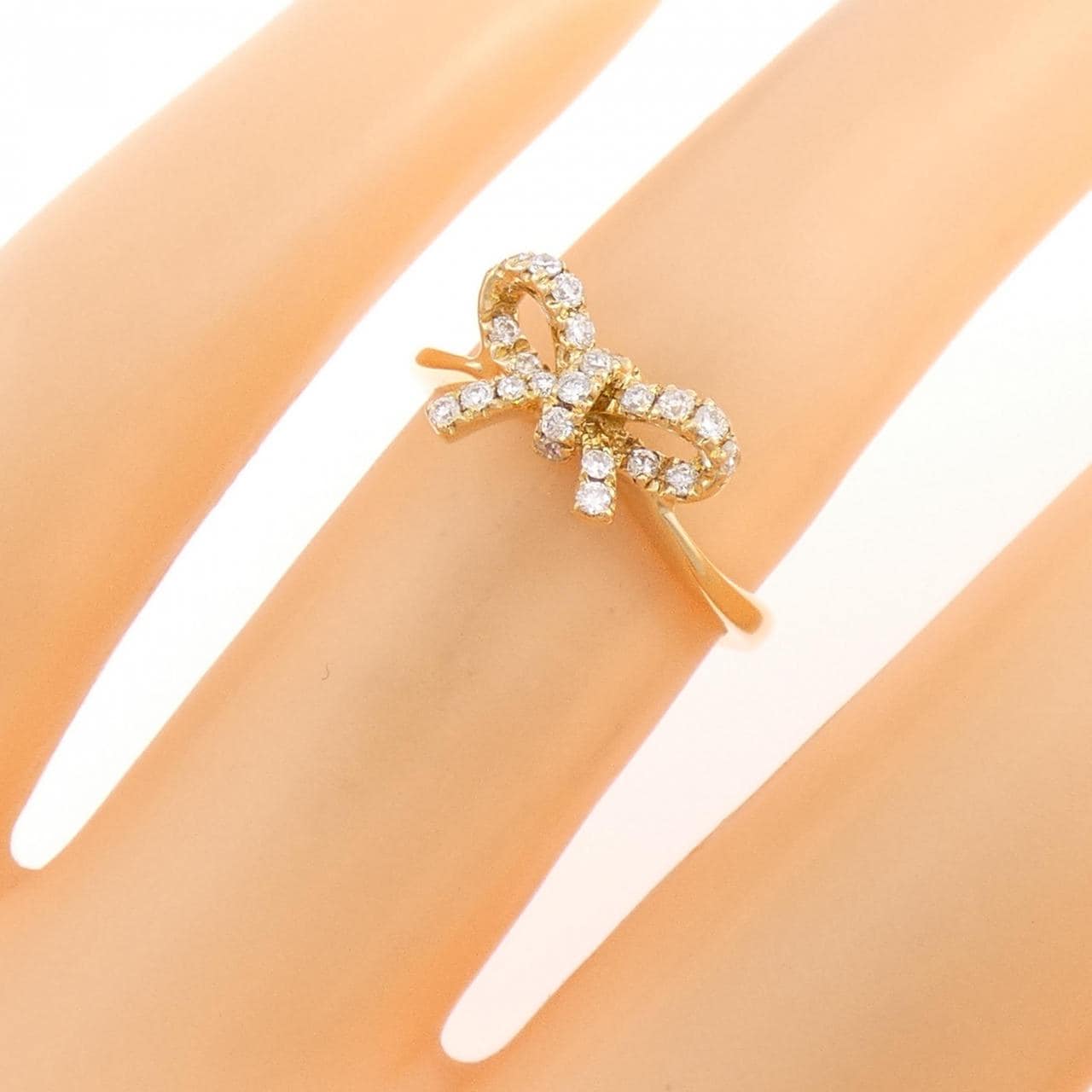 K18YG リボン ダイヤモンド リング 0.18CT