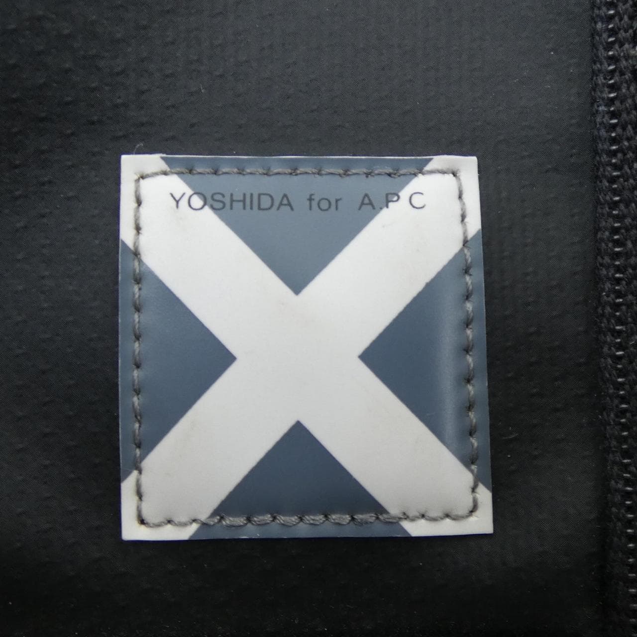 LUGGAGE LABEL BACKPACK