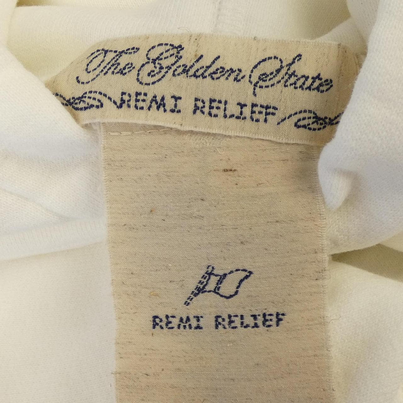 レミレリーフ REMI RELIEF パーカー