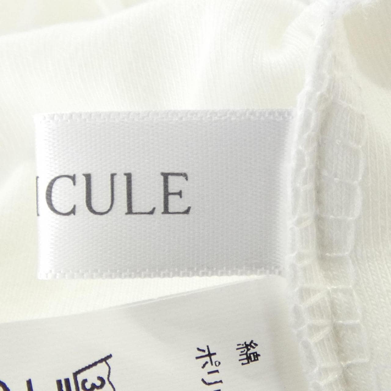 PELLICULE 095 トップス