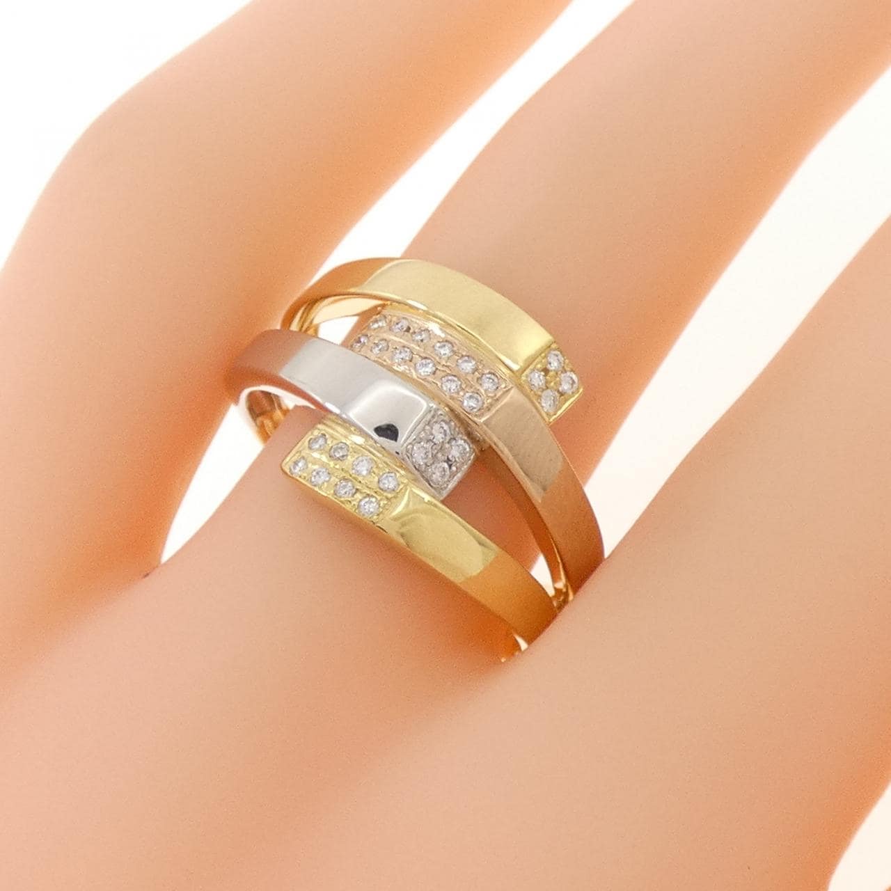 K18YG/PT900/K18PG ダイヤモンド リング 0.10CT