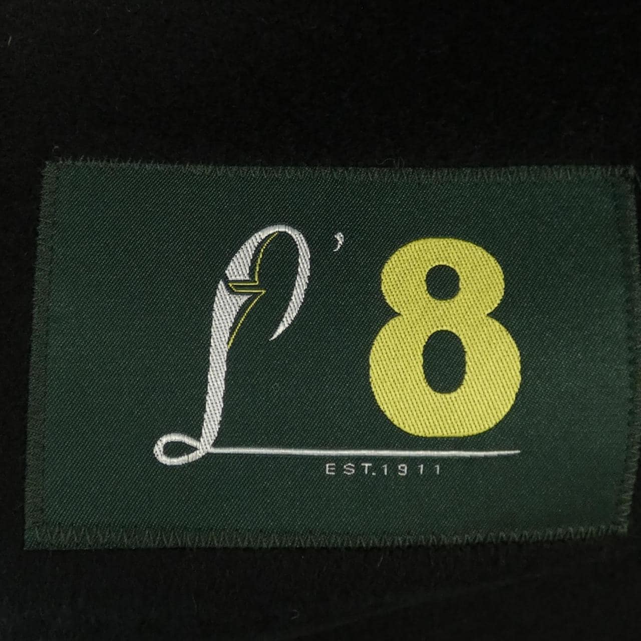 L'8 コート