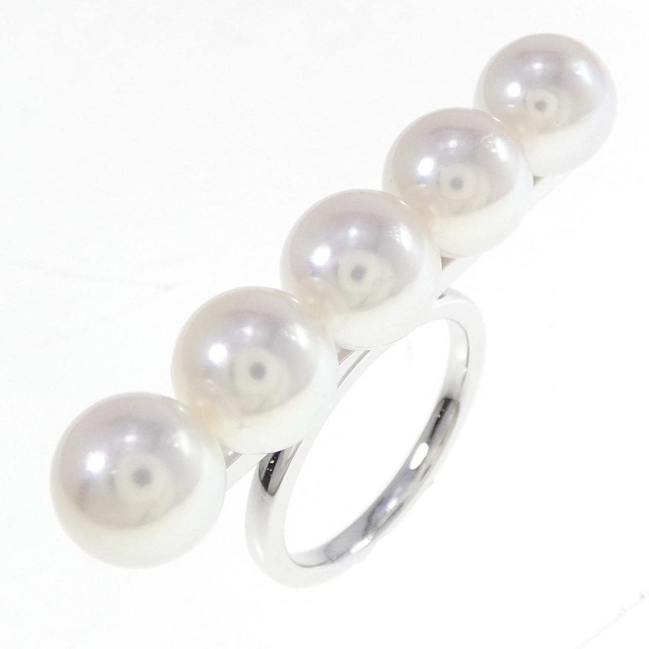 Tasaki balance signature ring