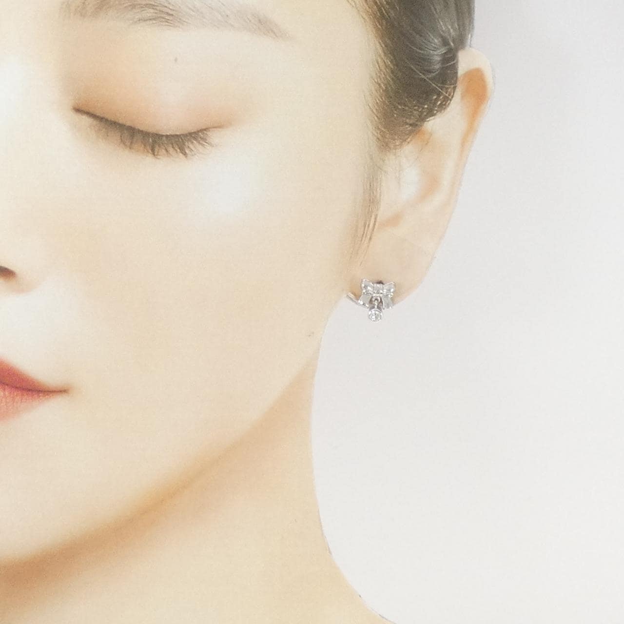 PT900 リボン ダイヤモンド ピアス 0.22CT
