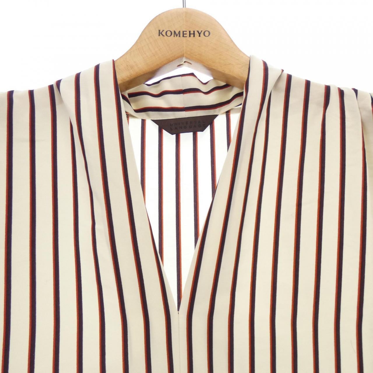 UNIVERSAL LANGUAGE トップス