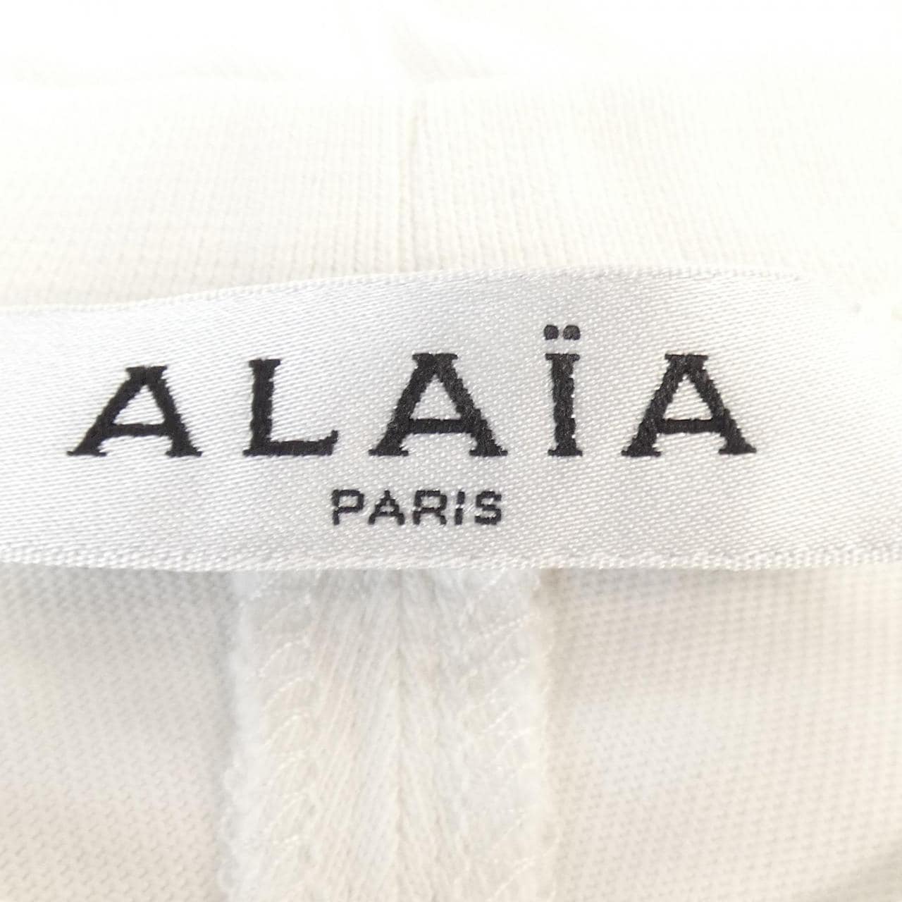 アライア ALAIA AA9H02913J010 Tシャツ