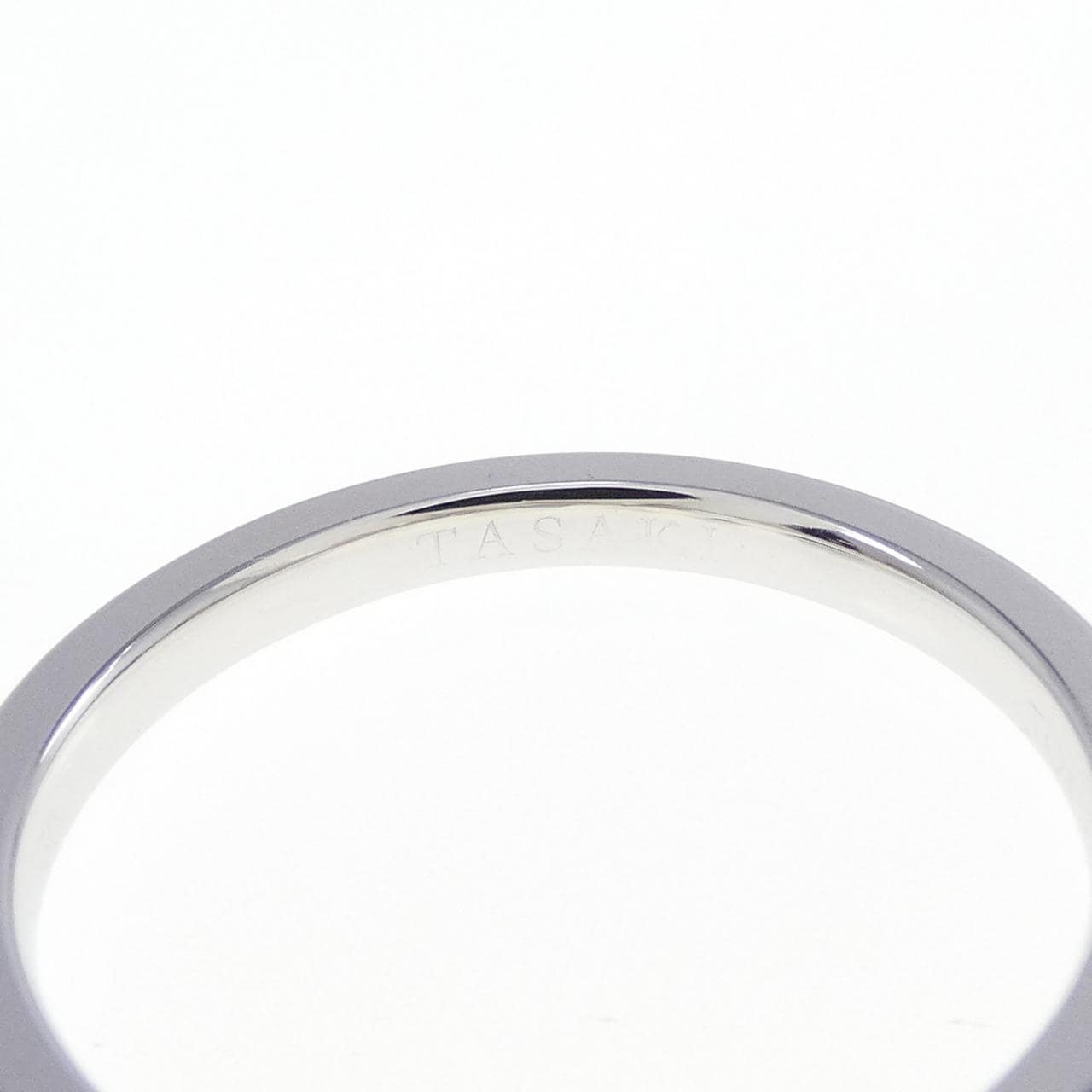 Tasaki balance signature ring
