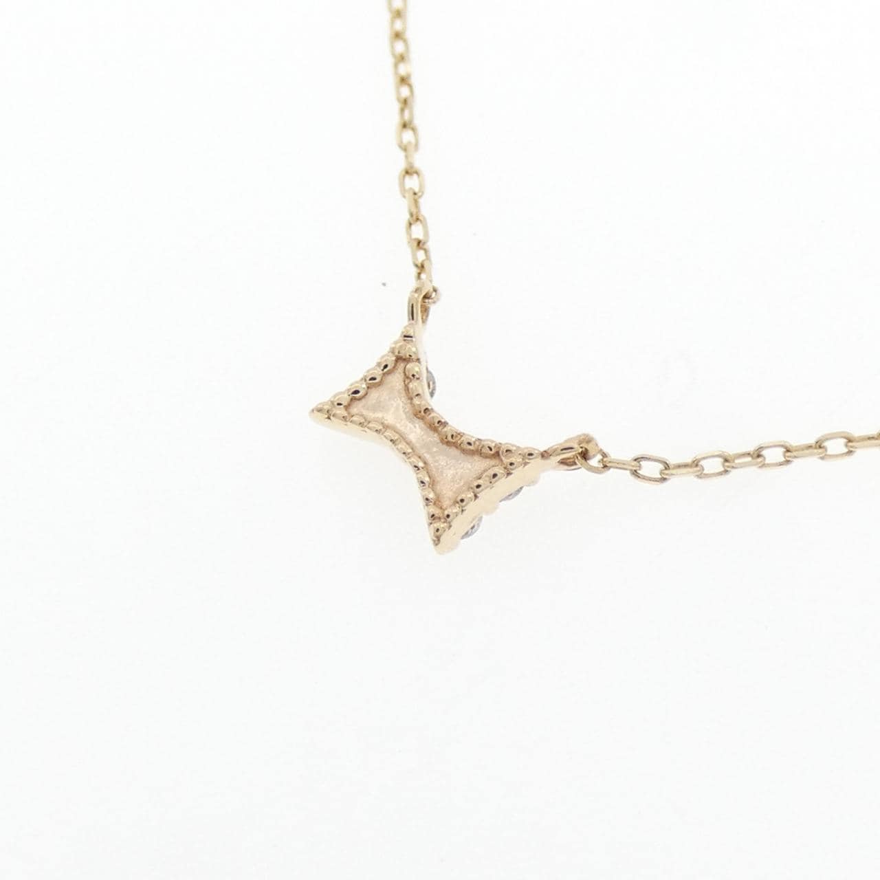 K10YG リボン ダイヤモンド ネックレス 0.04CT