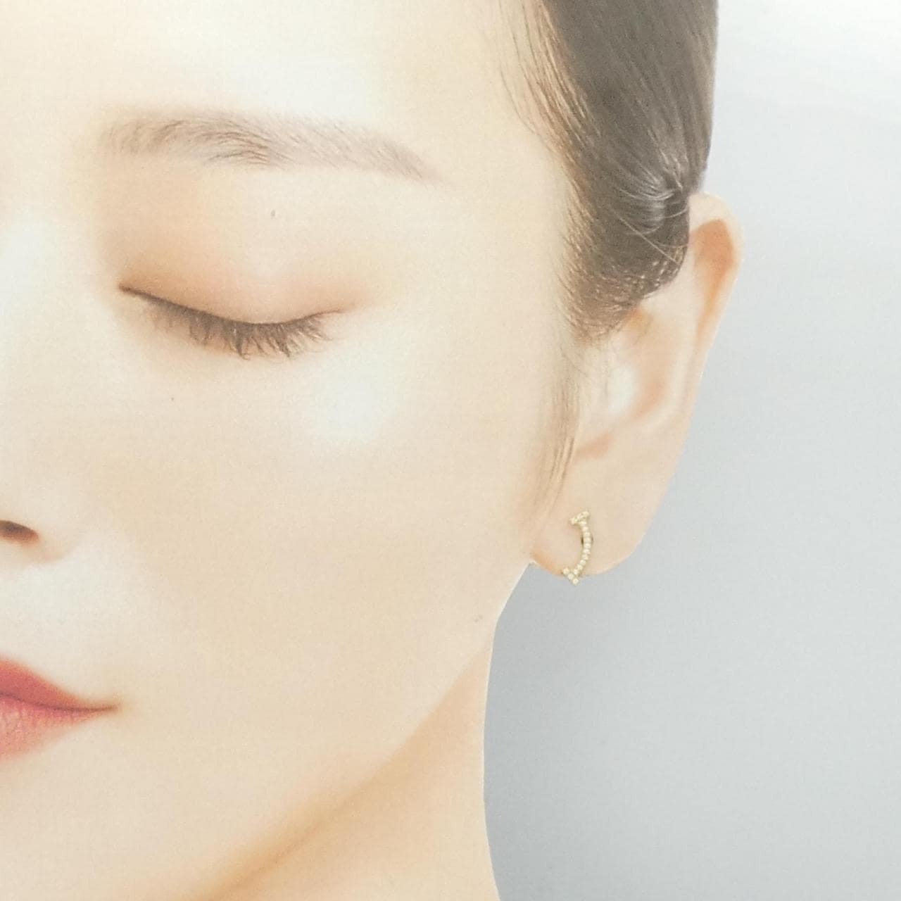 ティファニー Tスマイル ピアス