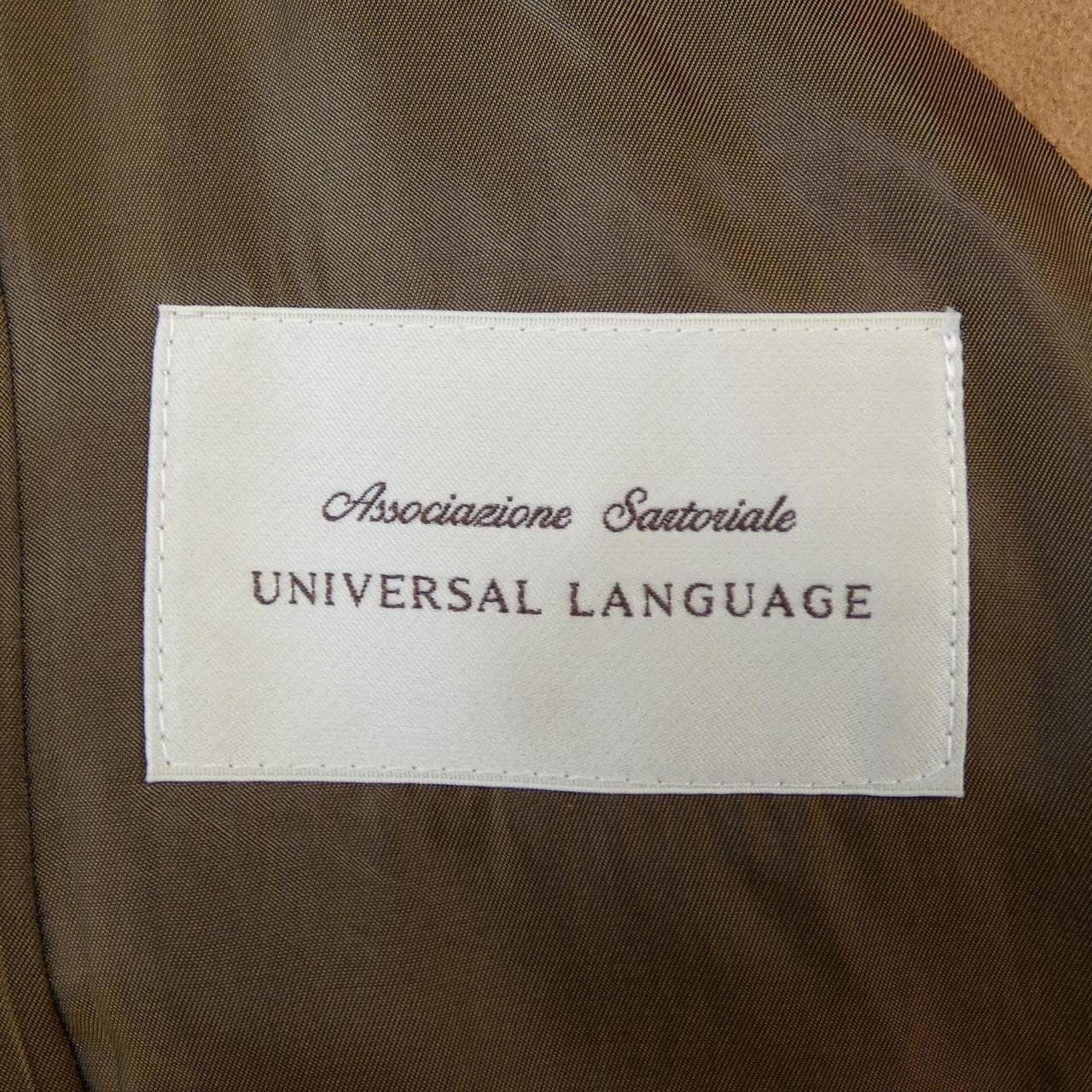 ユニバーサルランゲージ UNIVERSAL LANGUAGE コート