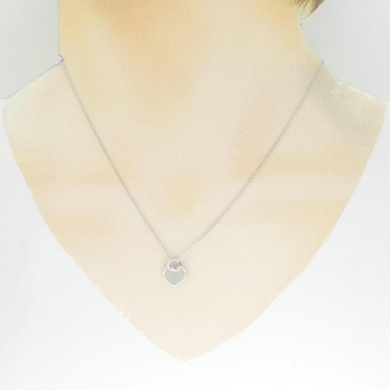 Cartier heart motif necklace