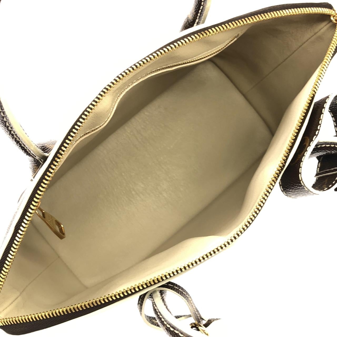 ルイヴィトン シャイニー モノグラム ロックイット M40597 バッグ