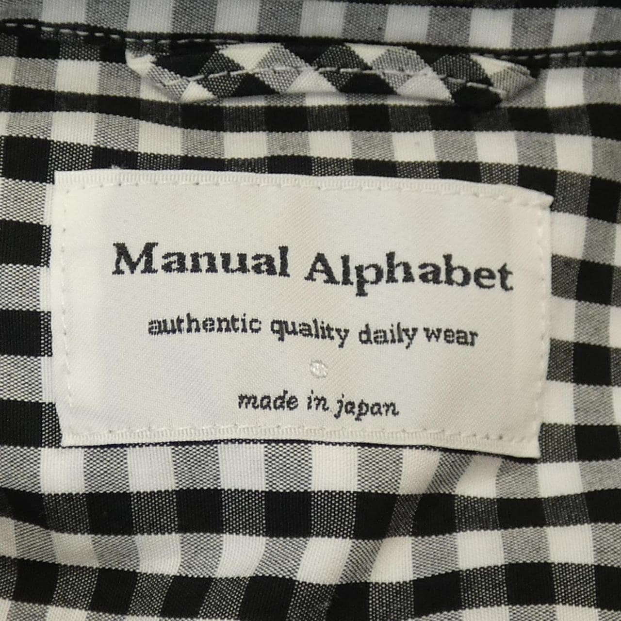 マニュアルアルファベット MANUAL ALPHABET シャツ