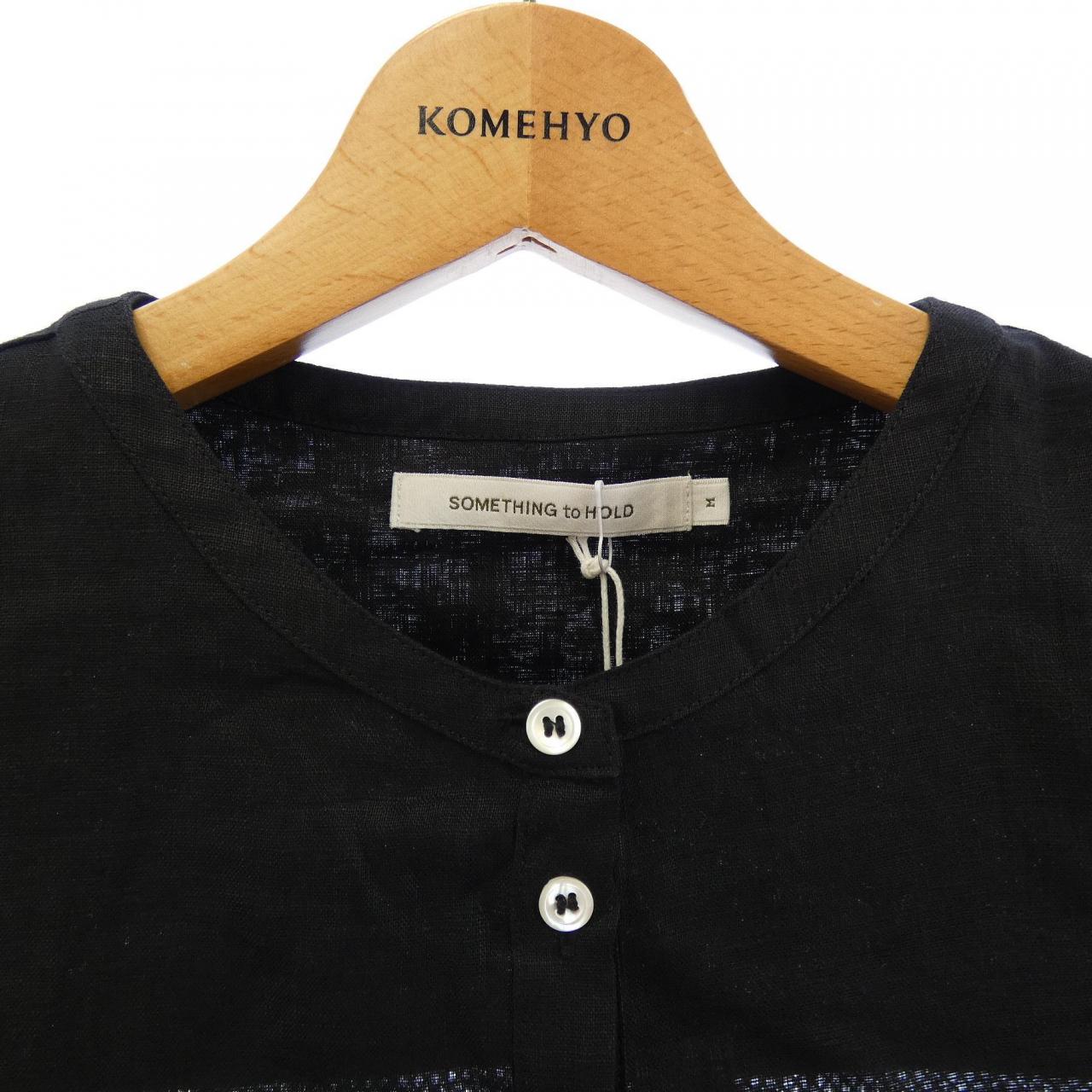 SOMETHING to HOLD トップス