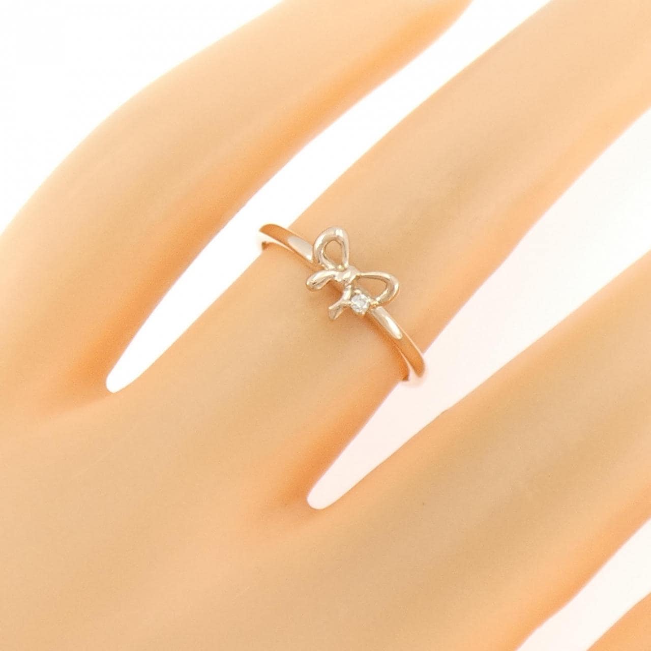 K10PG リボン ダイヤモンド リング 0.01CT