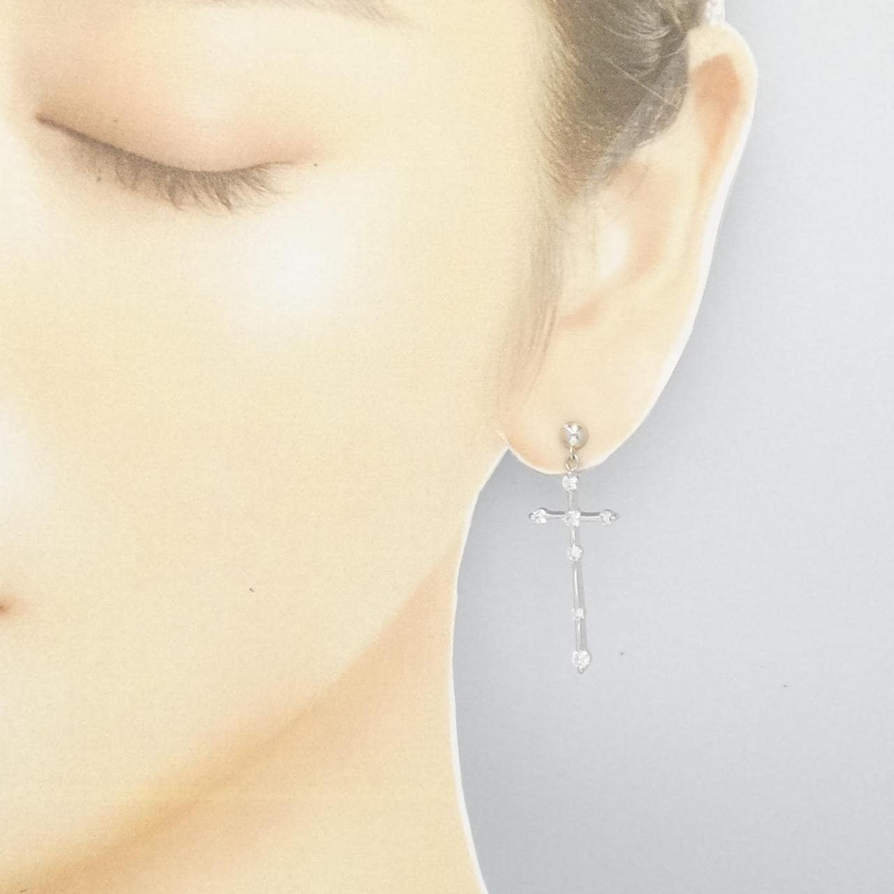 PT cross Diamond earrings one ear 0.40CT