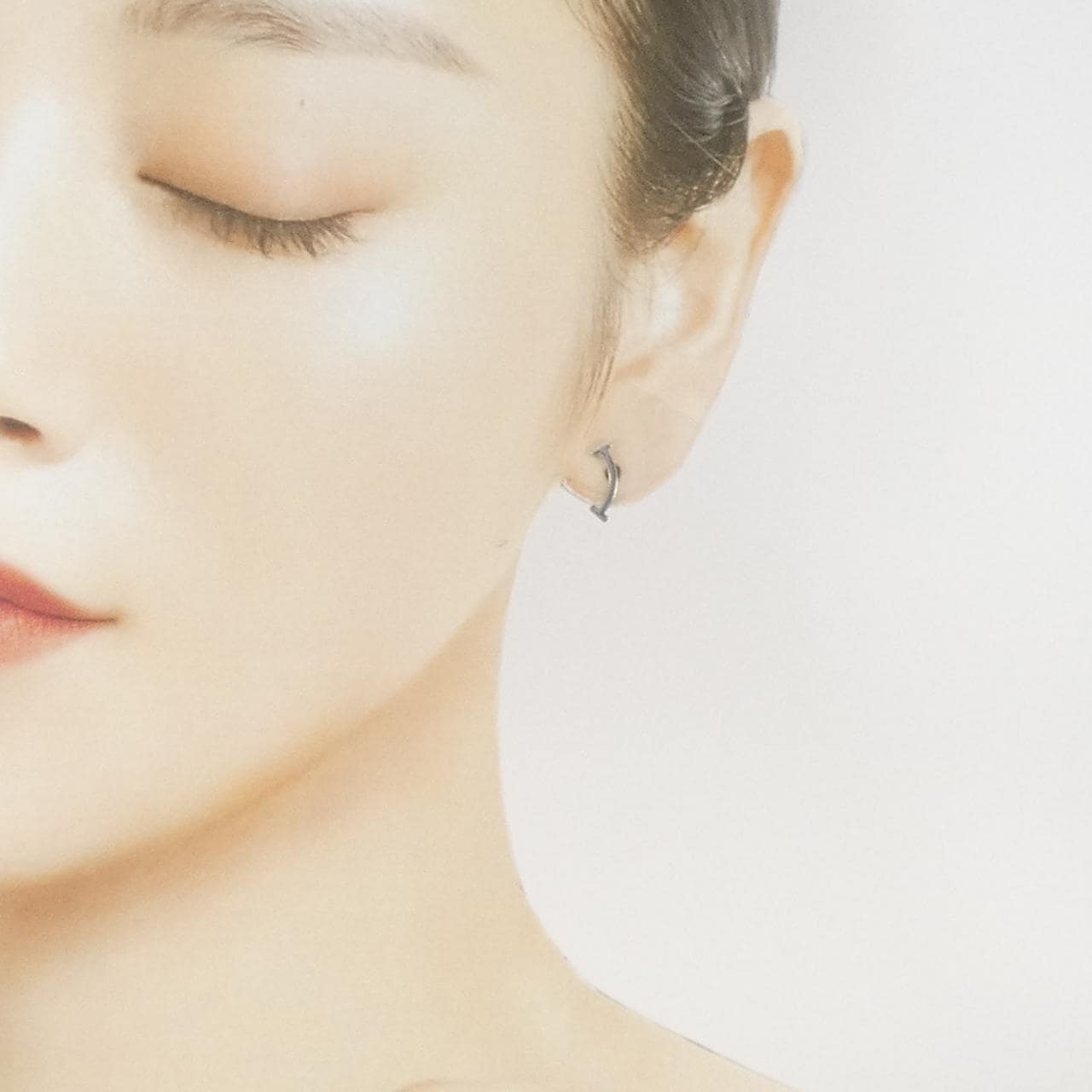 ティファニー Tスマイル ピアス