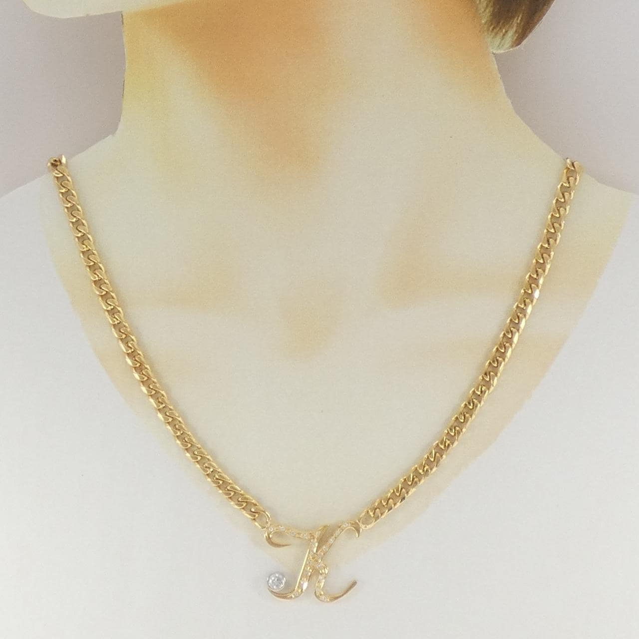 K18YG/PT900 イニシャルK ダイヤモンド ネックレス 0.27CT