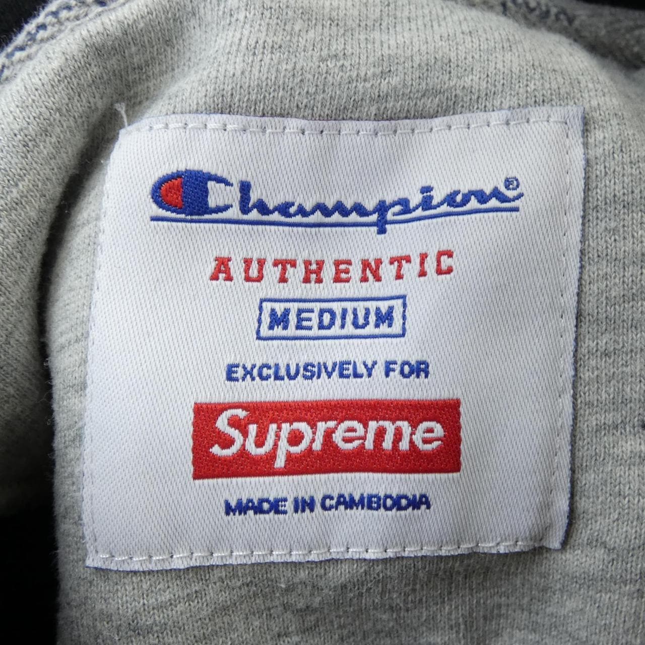 シュプリーム SUPREME CHAMPION パーカー