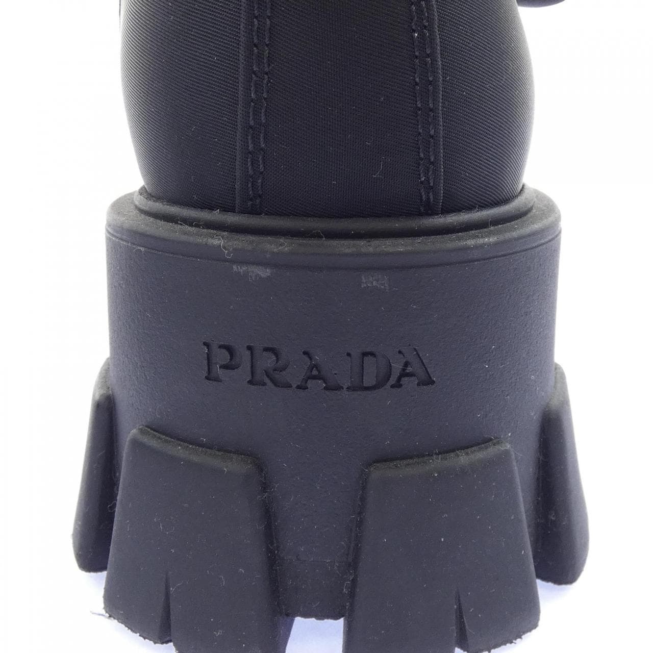 プラダ PRADA モノリス トライアングルロゴ 1T549M ブーツ