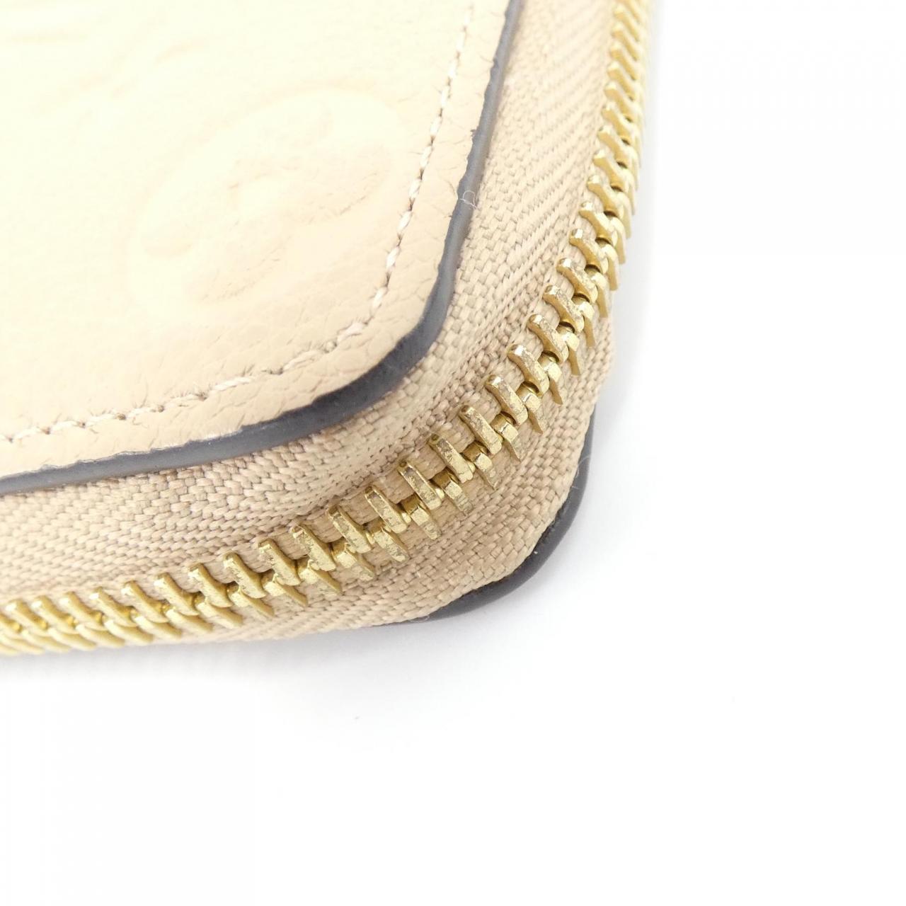 LOUIS VUITTON Monogram Empreinte Clemence M60173 Wallet