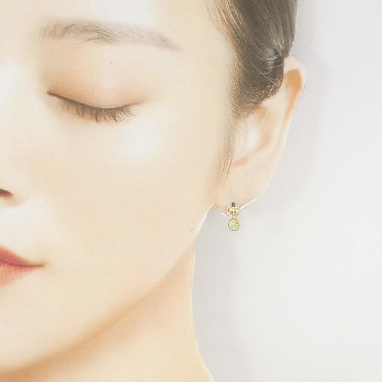 K18YG リボン ペリドット ピアス