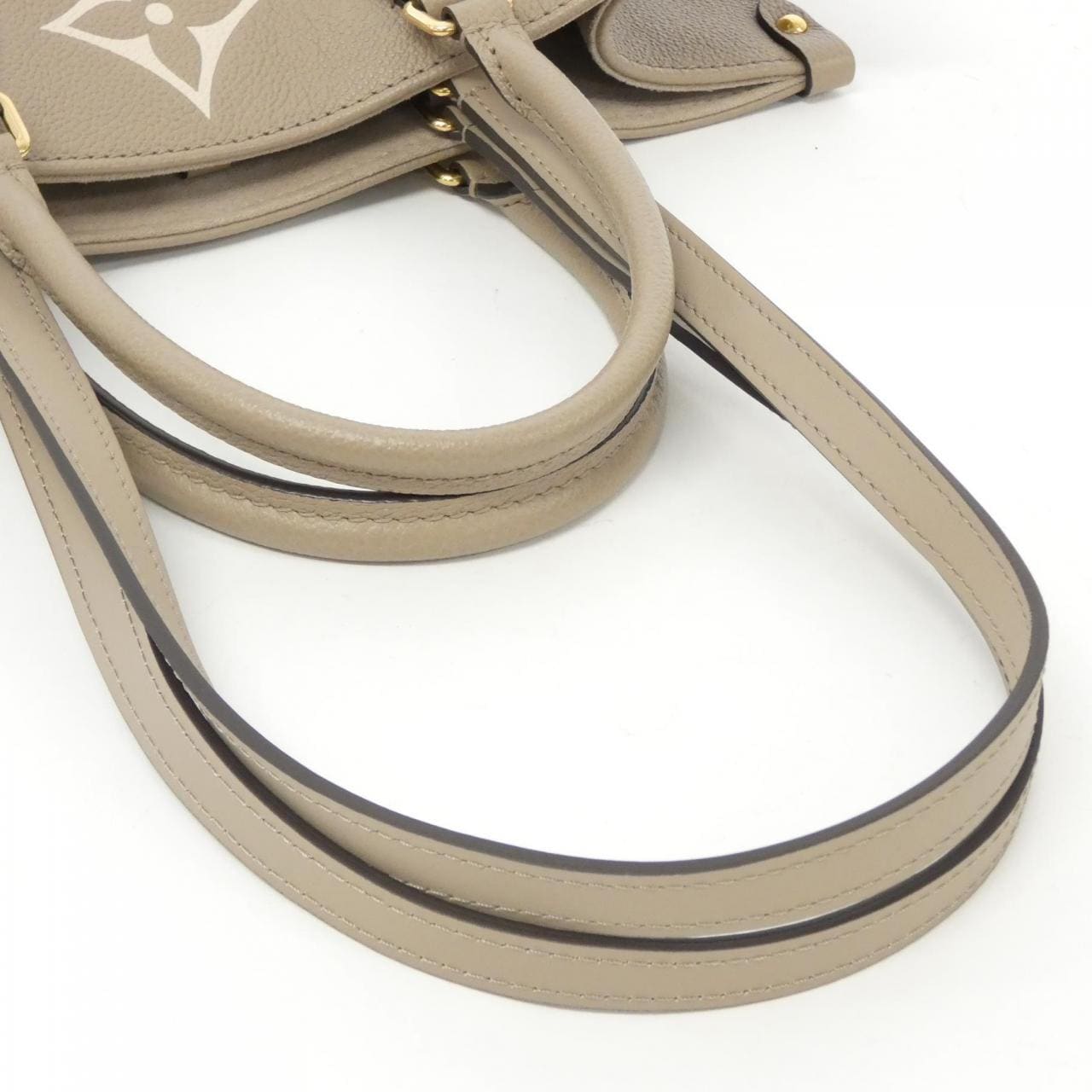 LOUIS VUITTON Bicolor Monogram Empreinte on the Go MM M45494 Bag