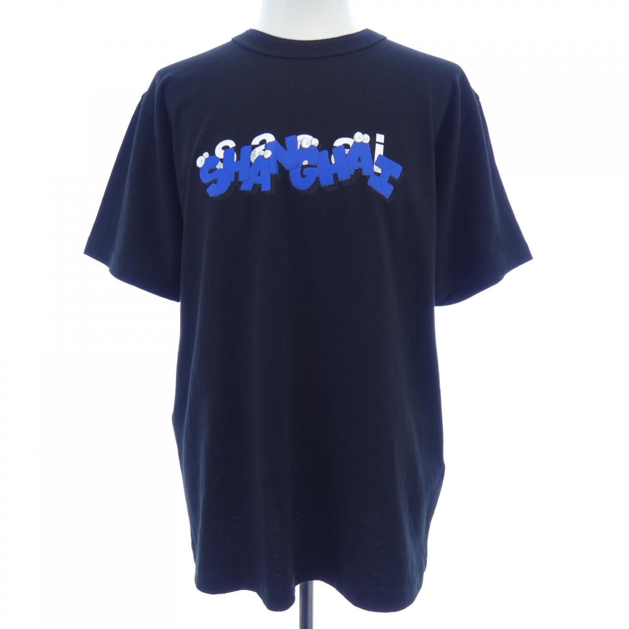 サカイ SACAI KAWS HOLIDAY XX Tシャツ