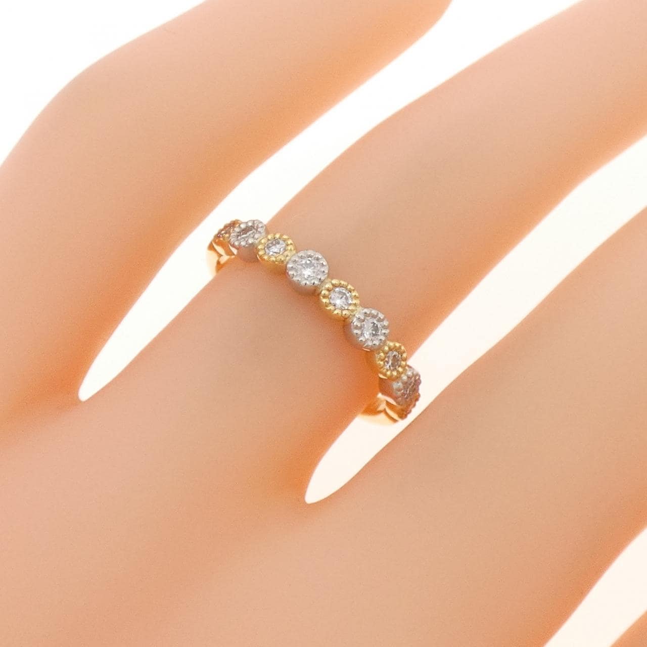 K18YG/PT950 ダイヤモンド リング 0.18CT