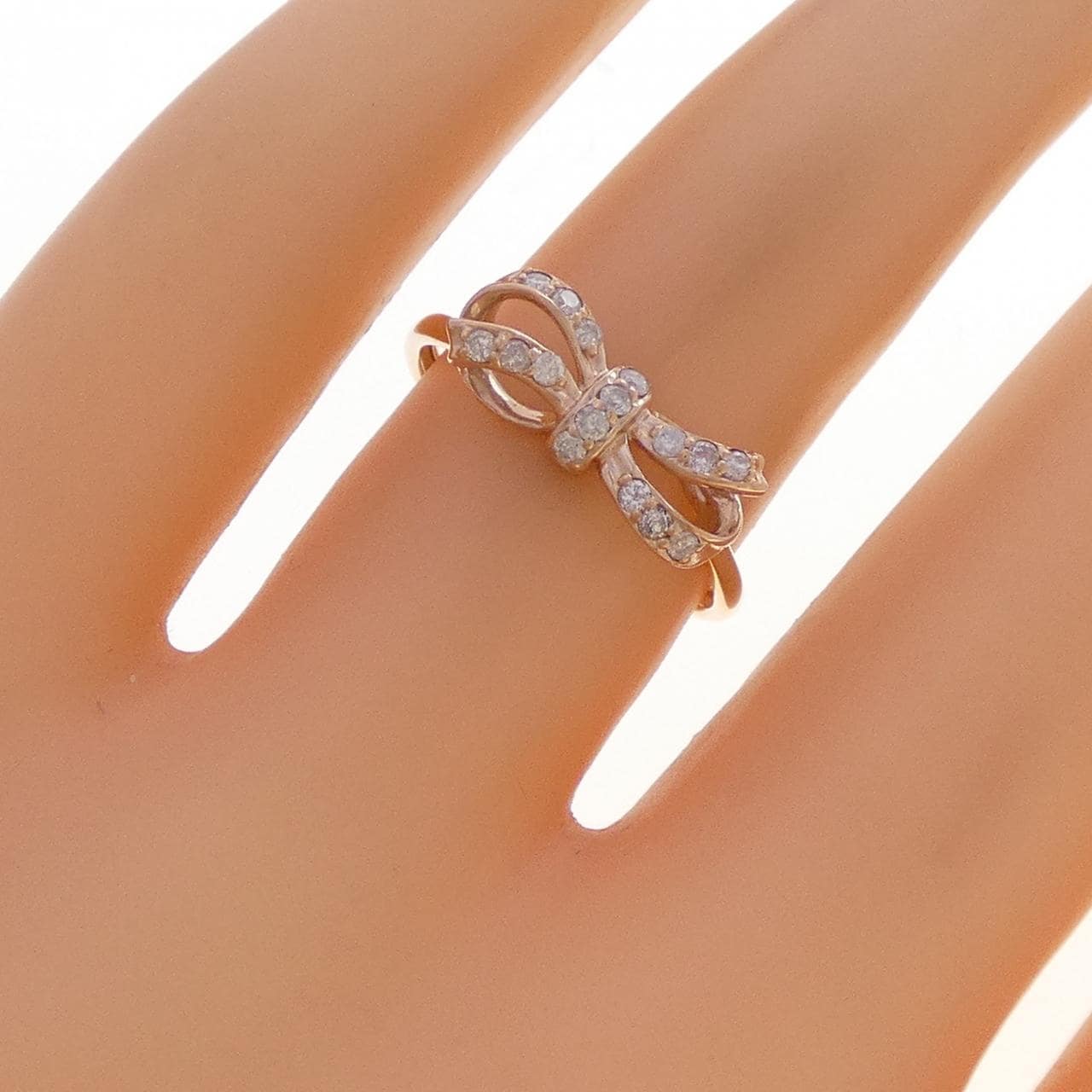 K10PG リボン ダイヤモンド リング 0.15CT