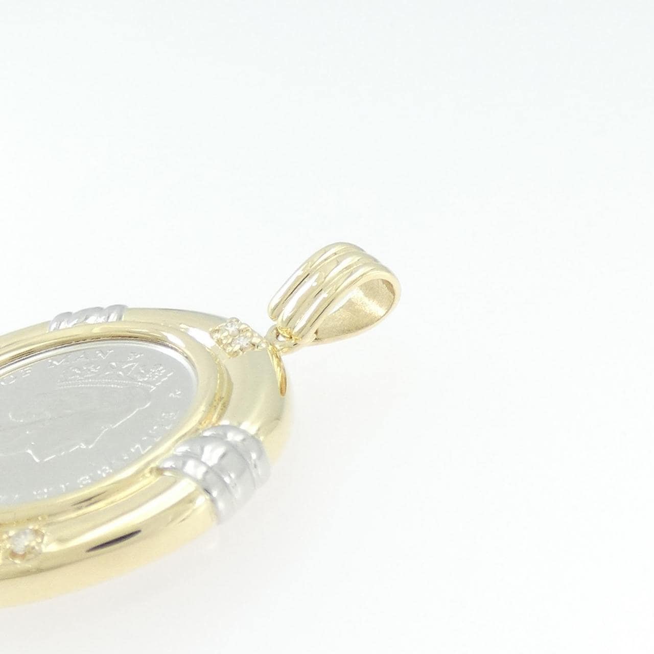 K18YG/PT(枠) ダイヤモンド コイン ペンダント 0.06CT