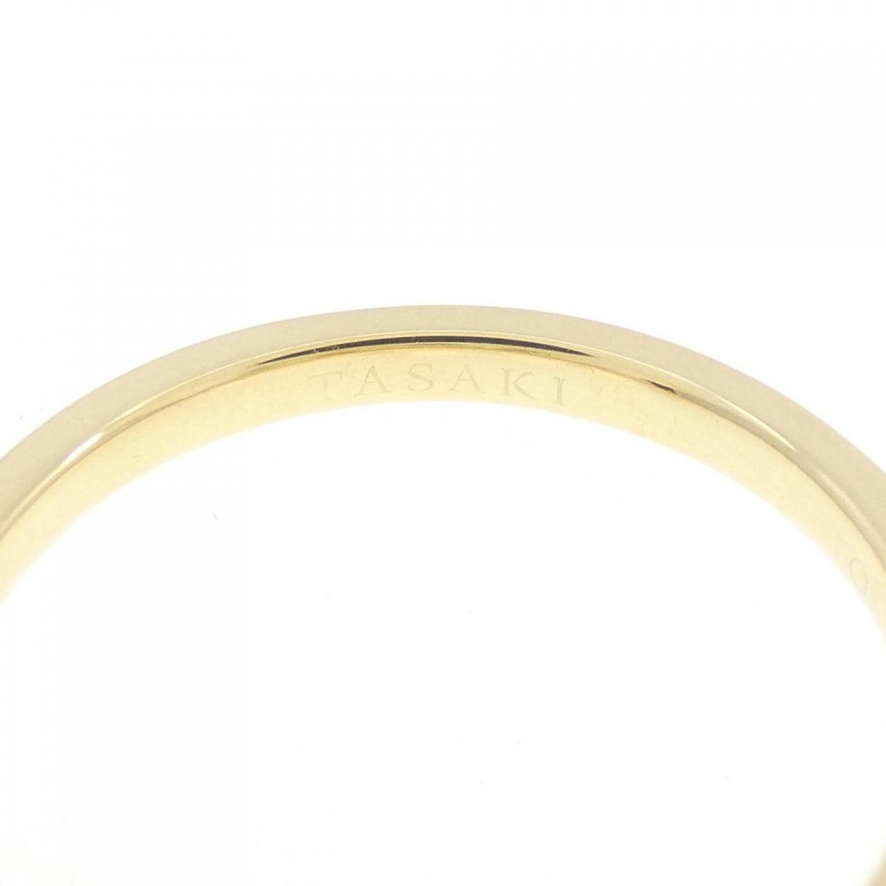 Tasaki balance signature ring